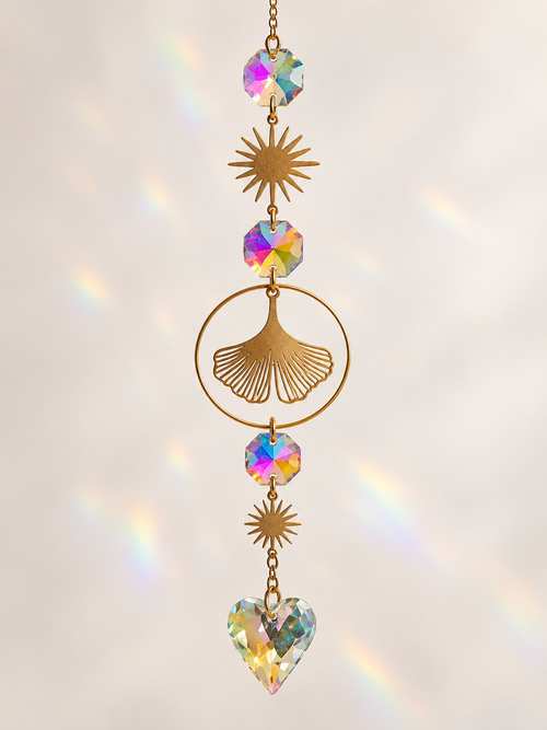 Ginkgo leaf, sunburst charms and iridescent accents detail